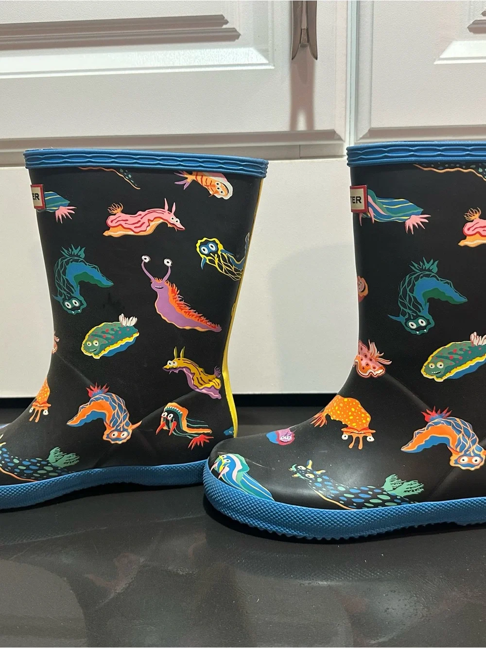 Hunter Kids Black Rain Boots with Colorful Sea Creature Print and Blue Trim